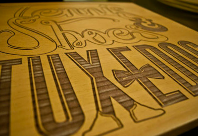 Laser Etching chaplin etching kyle laser shoes tennis type typography wood