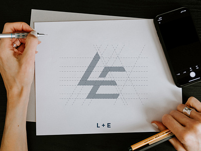 "L + E" Letter design.