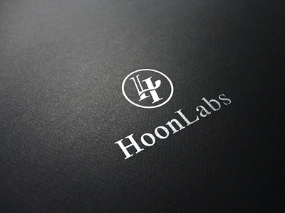 Logo for HOON LABS (Digital Asset Trading Firm) branding catchy clever genius genius idea graphic design hidden message initials labs logo memorable