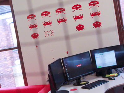 Space Invaders laser red monitors office photo photograph red space invaders three screens white wall