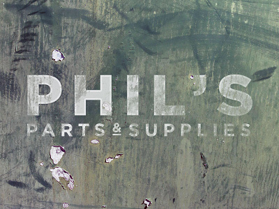 Phil's Parts and Supplies brick logo mock up peeled paint retrosupply rust texture