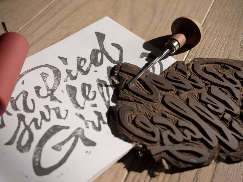 linocut lettering by Grégoire Cheynier on Dribbble