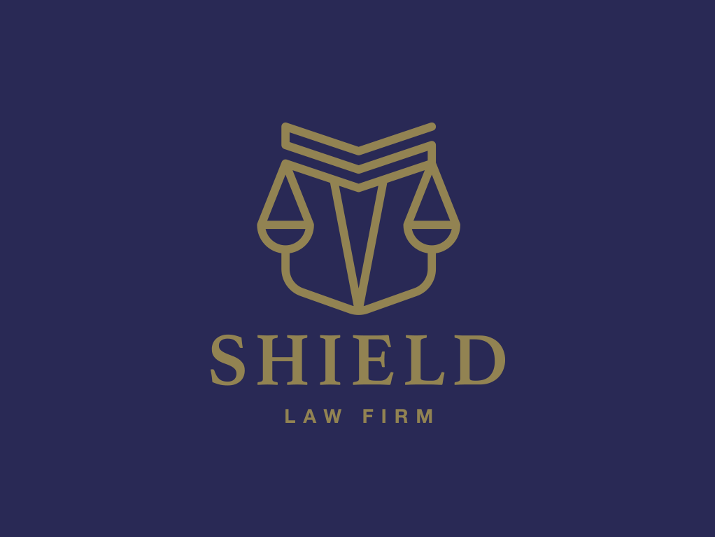 Law Firm logo incorporating a shield and a scale of justice