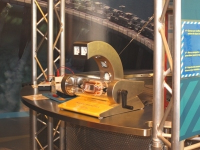 CCV Tavira's Exhibit "Magnetic Induction" coil copper crank faraday gauge generator hand induction law led light magnet magnetic magnetism power projector shaft