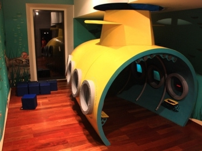 CCV Lagos Exhibit "Submarine" blue cube cubic exhibit fiberglass hull interactive kids periscope pipes playground sceens stool submarine tower tubes window yellow