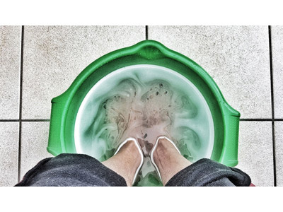 Hm … that feels good. editorial concept green footbath photography