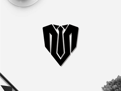 letter M + Tie monogram logo