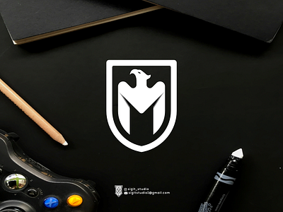 M + Eagle monogram logo concept