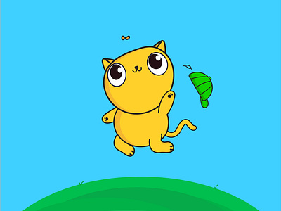 Cute yellow cat catching butterfly