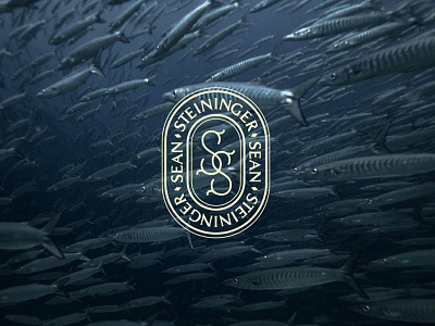 Sandy Man diver fish logo monogram scuba