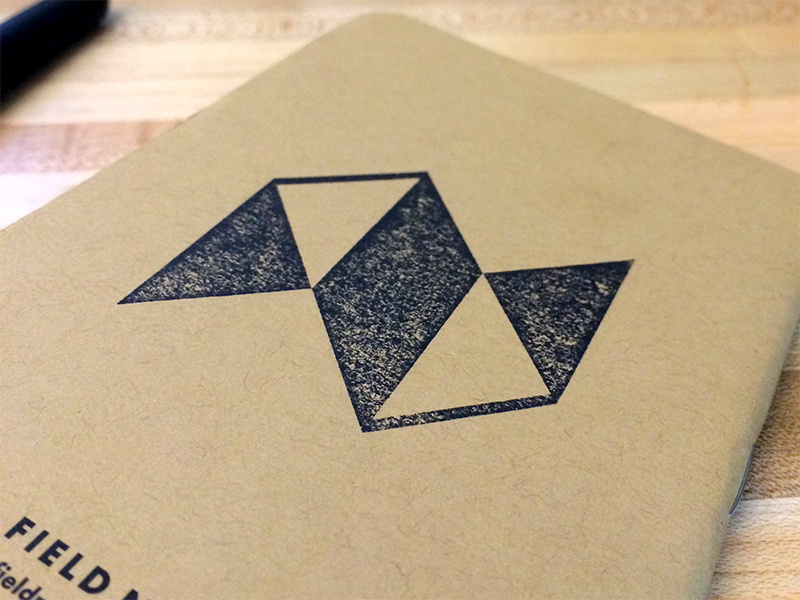 NewsCred logo rubber stamp swag wood mark logo texture notebook rubber stamp ink newscred