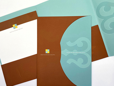 Creative Design Concepts Branding branding corporate identity diecut emboss graphic design logo presentation folder