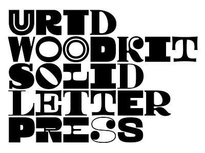 Woodkit Solid Letterpress alphabet font geometry letterpress mono monospace press square typeface wip wood woodtype