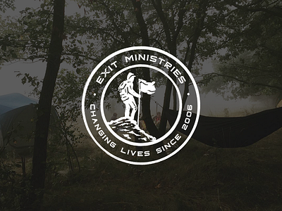 Exit Ministries Logo backpack camping circle climbing extreme flag hike logo man mountain rock woods