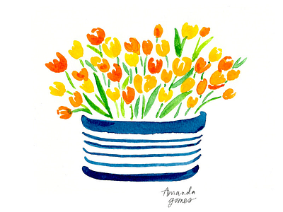 Tulips in a striped bowl