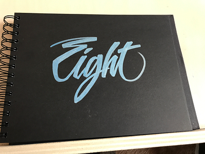 Eight brush script hand written