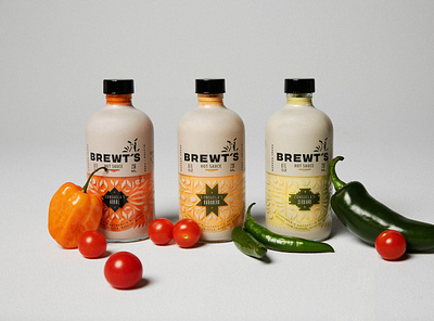 BREWT'S Hot Sauces art direction bottle branding chihuahua design dog dog logo food full circle hispanic hot sauce logo logo design packaging packaging design pattern peppers rebrand spicy