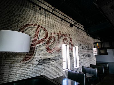 Ghost sign painting project for Pete’s Pizza in Chicago. chicago distressed signs ghost signs hand painted murals sign sign painting signs
