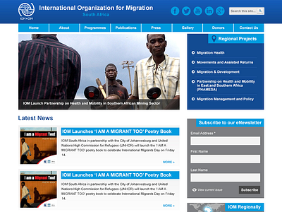 Iom Homepage - updated version blue clean flat grey homepage non profit simple website