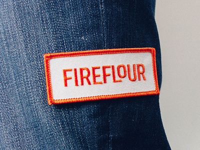 Fireflour Patch agency brand jacket logotype orange patch pizza studio twin forrest