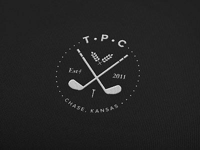 TPC Rough Draft badge clubs golf logo tee