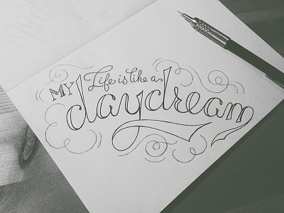 My life is like a daydream black and white calligraphy cursive hand drawn lettering loops pen pencil script swash type typography