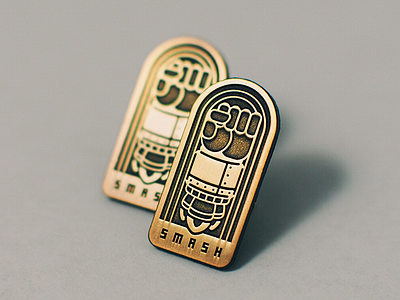 The SMASH Pin Drop antique enamel fist gold lapel pin metallic pin pin drop rocket san diego smash