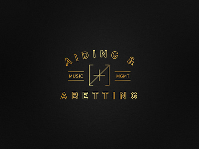 Aiding & Abetting black design gold logo music trademark yum