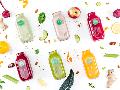 Joy's of Living brand campaign designer flatlay food juice photoshoot art direction website