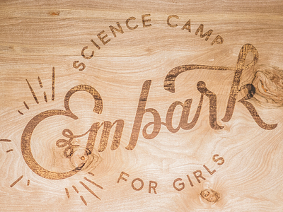 Embark Science Camp Wood Engraved Logo design engraved hand lettering logo science typography wood