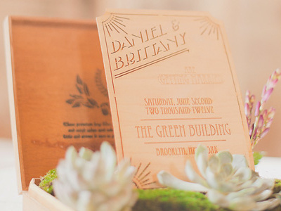 Laser-cut wood invitation at The Green Building