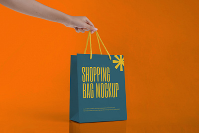 Hand Holding Shopping Bag Mockup merchandise