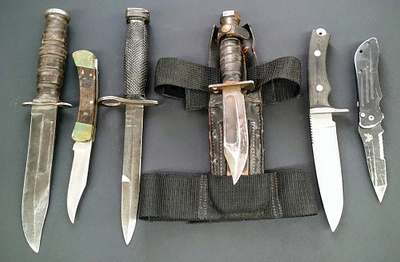 Battlefield to Everyday Carry: The Versatility of Combat Knives battleblades bestcombatknive branding combatcutlery combatknives combatknives2024 customknives graphic design knifeknowledge louismartinknives warriorweapons