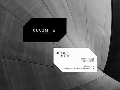 Dolomite Contracting brand identity branding business card design construction construction logo contractor dolomite graphic design masculine masculine logo polygon rock formation sleek design wordmark