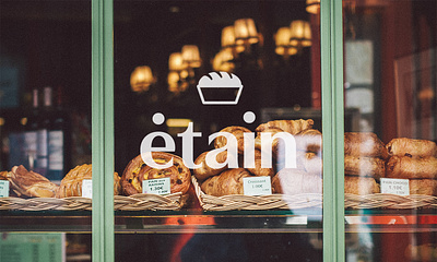 Etain/ logo on bakery window bakery boulangerie brand design brand identity branding bread design etain graphic design illustrator logo logo design logo mark logotype pastry photoshop window