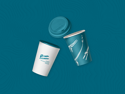 Mockup of souvenir products of the paleontology museum brand design branding corporate identity design dinosaur graphic design illustration logo mascot merchandise mockup museum paleontology paper cup pattern redesign vector