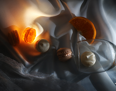 MACARON | FOOD PHOTOGRAPHY cup fabric food food photography graphic design light lighting macaron macaron train orange photography