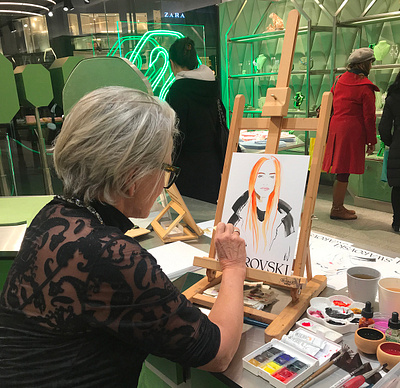 Luxury Treats at Swarovski X Katharine Asher event faces guest live drawing portraits