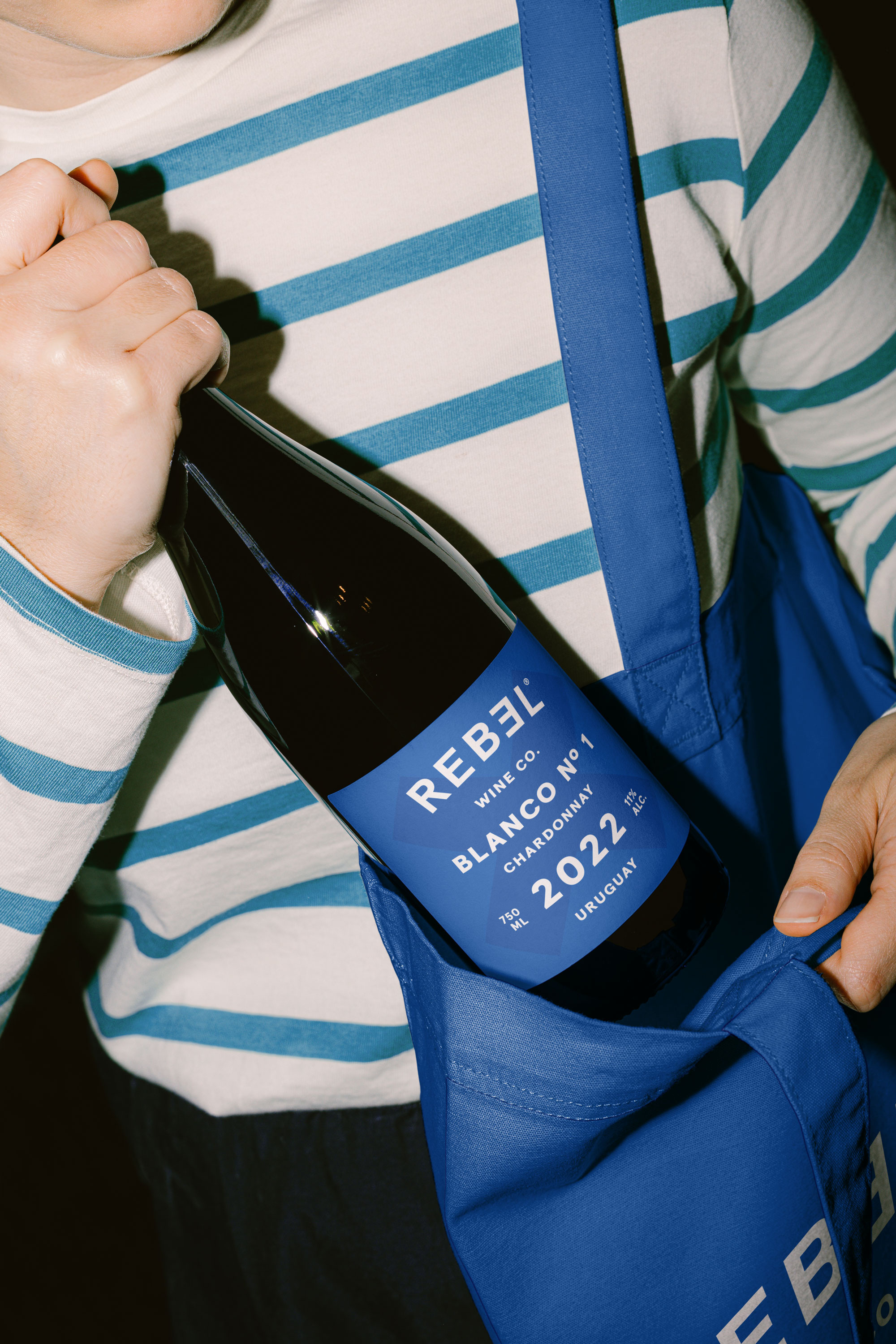 Rebel Chardonnay & Tannat brand brand design brand identity branding chardonnay tannat design graphic design label label design layout lifestyle packaging packaging design print print design visual identity wine wine label wine packaging