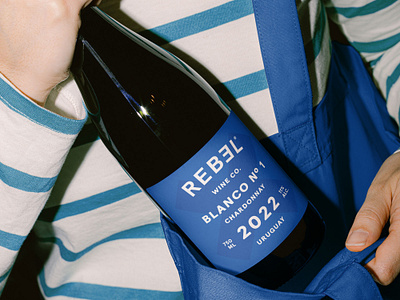 Rebel Chardonnay & Tannat brand brand design brand identity branding chardonnay tannat design graphic design label label design layout lifestyle packaging packaging design print print design visual identity wine wine label wine packaging