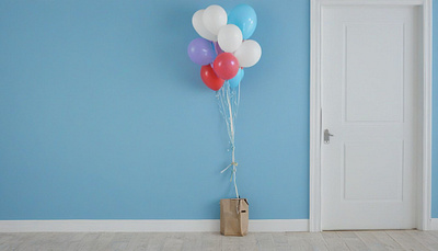 a-white-door-on-a-blue-wall--with-a-bunch-of-balloons-tied-on. illustration vector