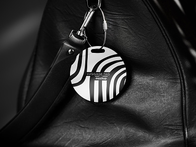 Round Luggage Tag Hanging on a Leather Bag Mockup PSD round