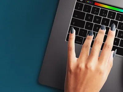 Macbook Pro 16" with Woman Hands Typing Mockup macbook