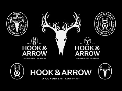 Hook & Arrow - Brand Assets badgedesign brandassets deerskull hookandarrow identitysystem illustration logo logodesign logosystem skull