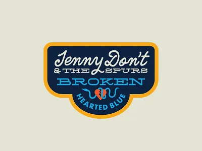 Jenny Don't & The Spurs badge branding broken heart country cowboy cowgirl design gold and blue graphic design logo merchandise patch quimby rodeo script silverfake snake typography western wild west