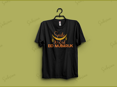 Smile It's Eid Mubarak apparel cloth clothing eid mubarak eid t shirt fabric fashion greetings message style t shirt tee text text based textile trend type typography wish wishes