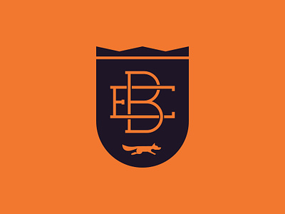 EB Crest badge cest fox monogram