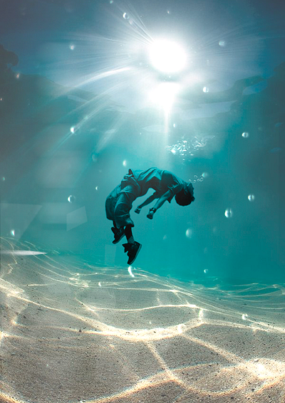 The guy is underwater collage graphic design posterdesign