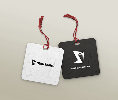 Clothing brand (Suki Maho) logo design on tags graphic design logo