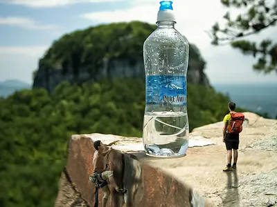 Water bottle photo manipulation advertising digital marketing fllyer design hiking mineral water mountain mountain bottle photo manipulation poster design struggle struggle for water unique design water bottle